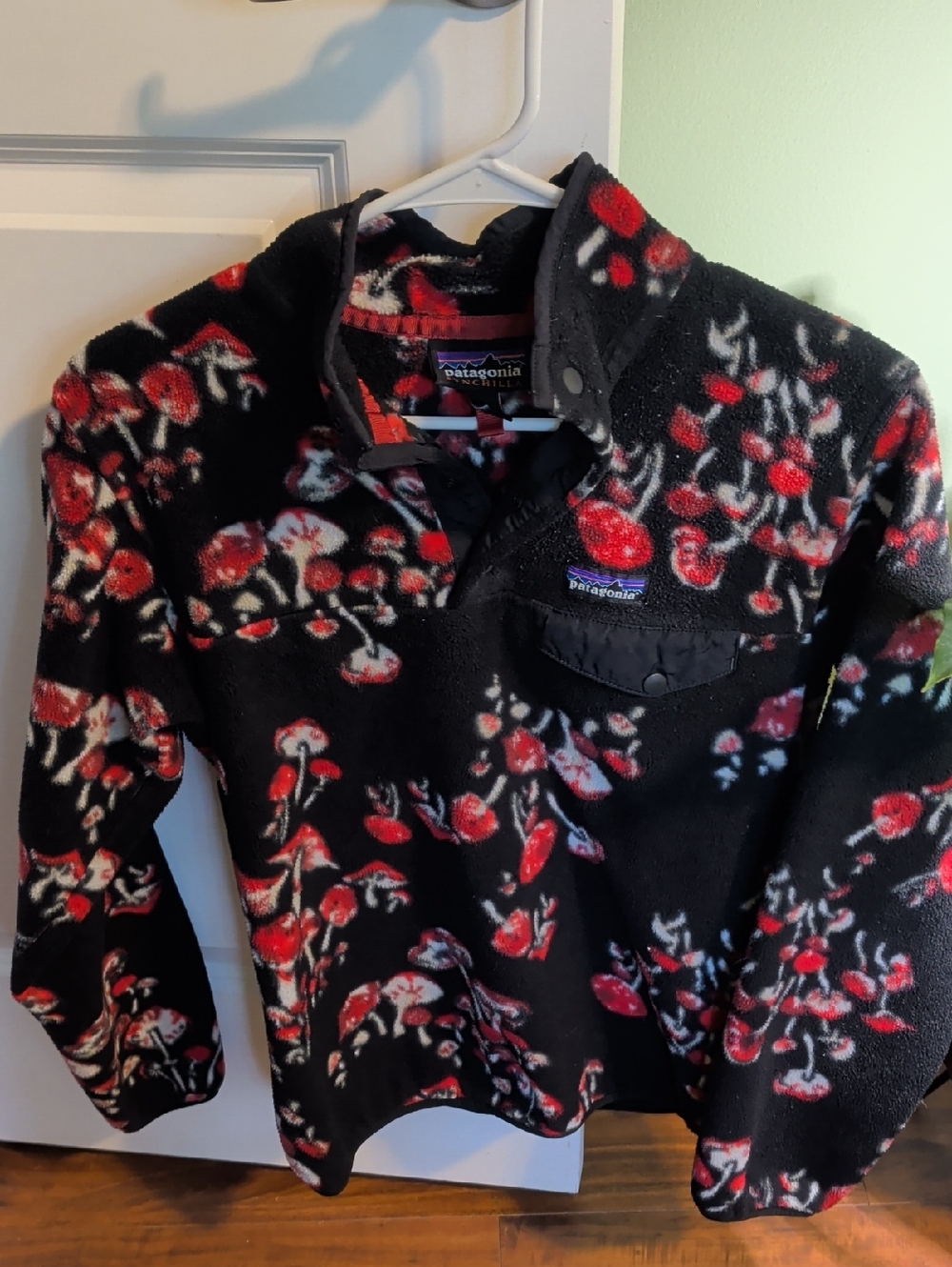 Patagonia Black Fleece Pullover with Red and White Floral Print